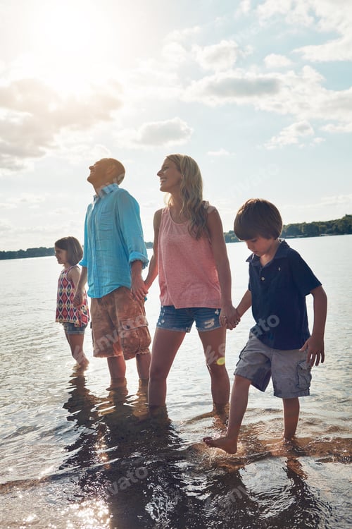 Preview: Parents, children and holding hands at beach for vacation, summer travel