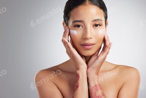 Preview: Beauty, lotion and portrait of woman in studio for cosmetology or dermatology benefits