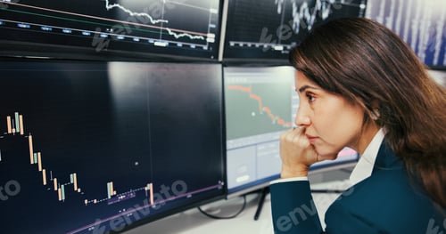 Preview: Data, monitor and thinking with broker woman in office for stock market ideas or investment