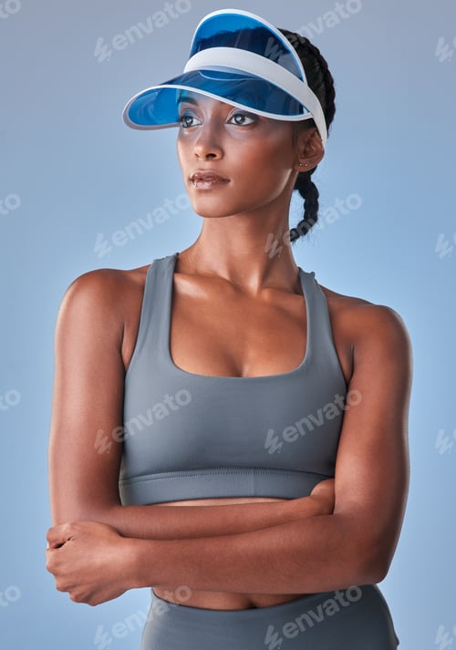 Preview: Woman, arms crossed and fitness with visor in studio, pride and athlete with sportswear