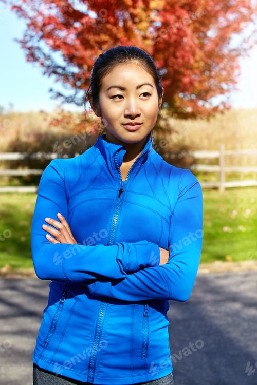 Preview: Arms crossed, fitness and thinking with asian woman in nature for running practice