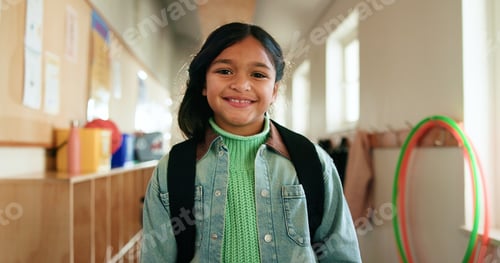 Preview: Child, portrait and smile in hallway for education, learning opportunity or back to school