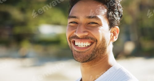 Preview: Ocean, portrait and man with smile, fitness and vacation with health benefits, excited and wellness