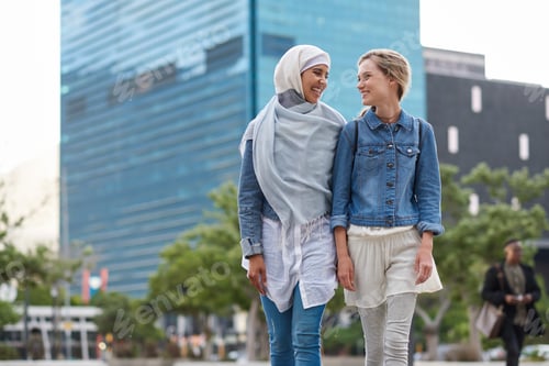 Preview: College, friends and women walk in city with smile, bonding together and travel to campus