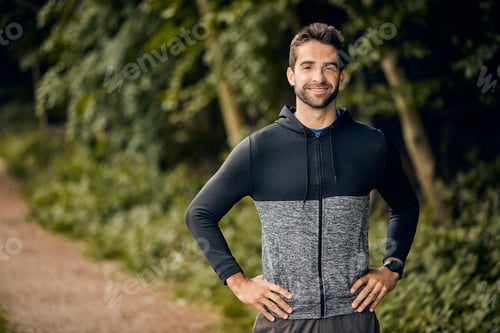 Preview: Portrait, fitness and man in forest, smile and training for health benefits, nature and pride