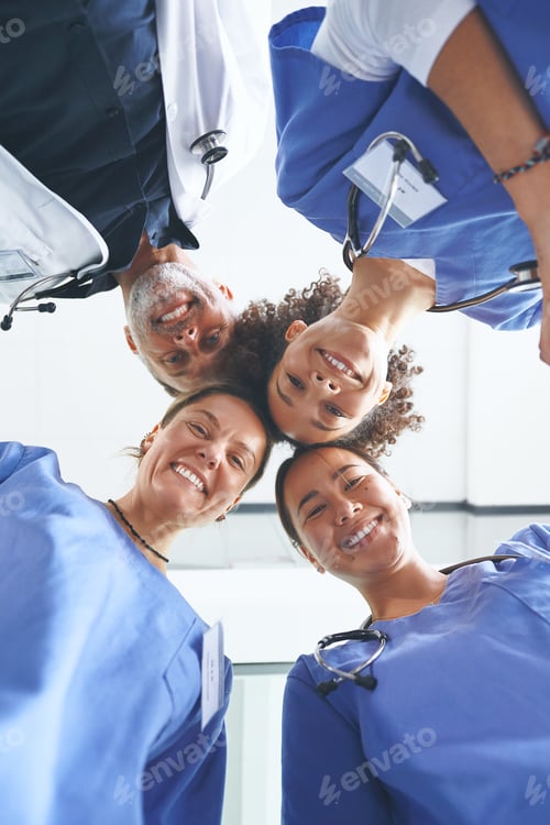 Preview: Smile, low angle and portrait with doctors in hospital for solidarity, synergy and healthcare