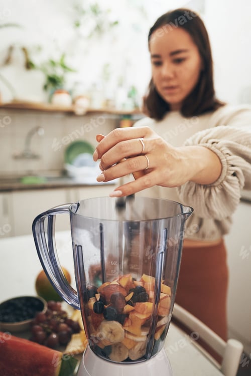 Preview: Smoothie, hands and woman in kitchen, blender and ingredients for health benefits