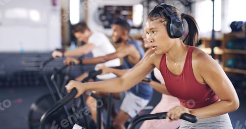 Preview: Spin class, cardio and headphones with woman in gym for intense workout