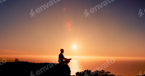 Preview: Sunrise, meditation and man on mountain by sea for reflection, mindfulness and peace in morning