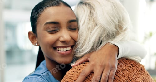 Preview: Senior, woman and caregiver hug in nursing home with smile, healthcare assistance