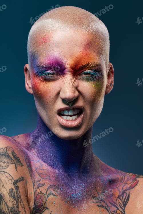 Preview: Fierce, makeup and portrait of woman in studio for art deco, creative aesthetic or personality