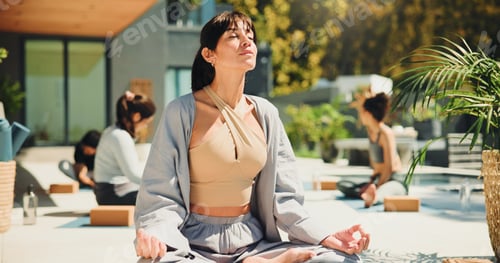 Preview: Yoga, woman outdoor and meditation with lotus pose, spiritual awareness or chakra healing in resort