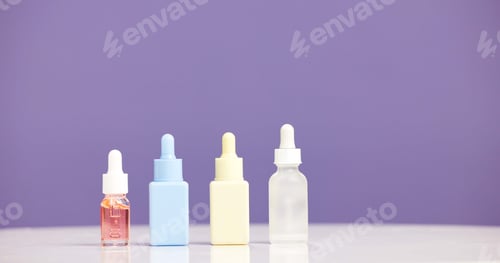 Preview: Bottle, serum and marketing for skincare in studio with mockup, space or promotion on purple