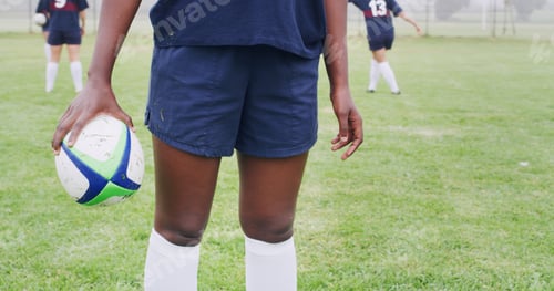 Preview: Rugby, ball and hands of woman on field for competition practice, sports tournament and fitness