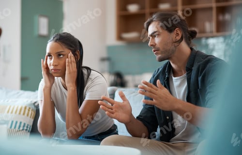 Preview: Argument, conflict and couple on sofa with tension, fight or frustration in toxic relationship