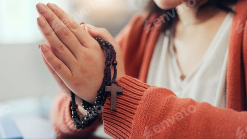Preview: Praying, rosary and hands of woman in home for religion, worship and belief for gratitude