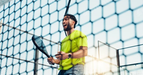 Preview: Padel, winner and fitness with excited with man on court for sports athlete