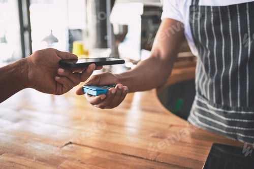 Preview: People, hands and barista with pos machine or phone for payment, checkout or scan on counter