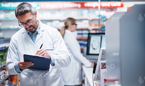 Preview: Mature man, pharmacist and writing on clipboard for information, medicine stock and inventory