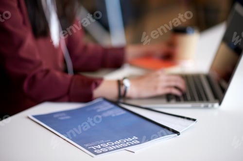 Preview: Documents, hands and typing in office with laptop, business proposal and plan for project