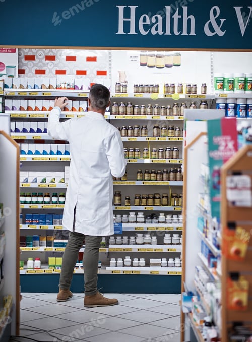 Preview: Pharmacist, man and pack stock on shelf for inventory control, check expiry date and product info