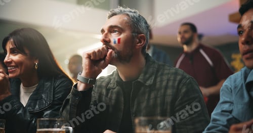 Preview: Sports, watching and man in pub with suspense for score, waiting for goal and live streaming