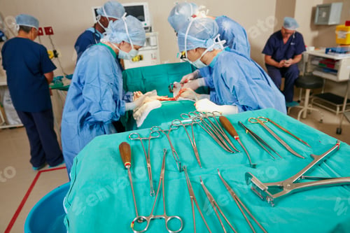 Preview: Team, surgery and patient on bed in operating room, collaboration and trauma response at hospital