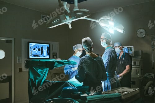 Preview: Surgeon, lights and people in operating room, medical service or face mask with procedure