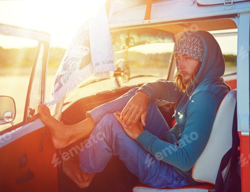 Preview: Man, road trip and thinking in car at sunset with perspective, flare and rest on vacation in summer