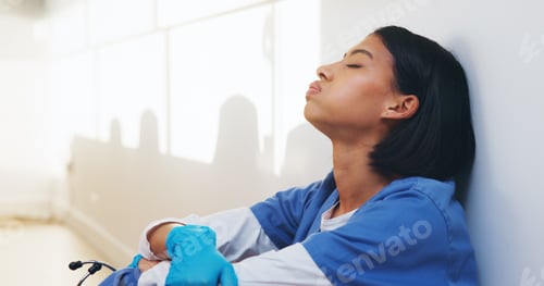 Preview: Tired, nurse and worry with woman in hospital for medical burnout, stress and thinking