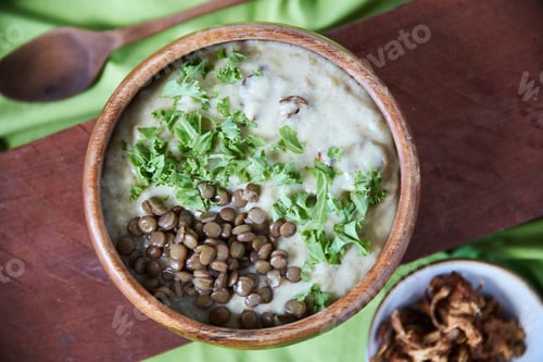 Preview: Above, food and lentil soup in bowl with kale garnish, vegetarian and healthy nutrition