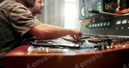 Preview: Hand, music and sound board with people in studio together for audio engineering or production