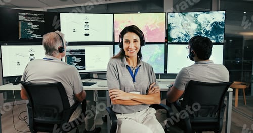 Preview: Control room, geospatial analyst and woman with arms crossed, confident and tracking global warming