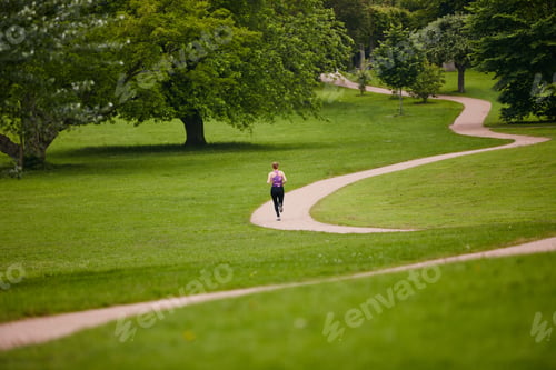 Preview: Running, back and woman in park, exercise and challenge with fitness, endurance or morning routine