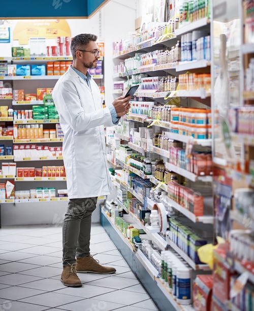Preview: Pharmacist, man or inventory inspection with tablet for online order, prescription or product info