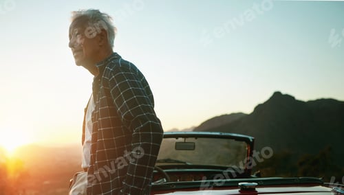 Preview: Senior man, smile and road trip with car, sunset and reflection in nature for vacation or travel