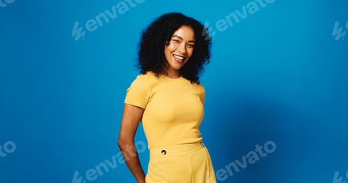 Preview: Funny, portrait and woman in studio for fashion, confidence and happiness on mockup space