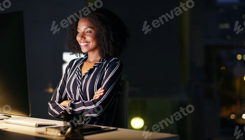 Preview: Night, business and black woman with computer in office, reading email or thinking of article