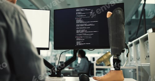 Preview: Person, computer screen and programming with prosthetic leg for robotic development in laboratory