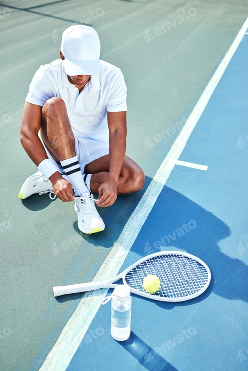 Preview: Tennis, man and tying shoes in high angle for outdoor sports, training and preparation on court