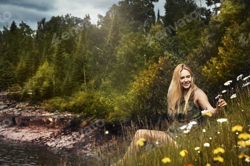 Preview: Nature, relax and woman by river for holiday, getaway or weekend trip by flowers with thinking