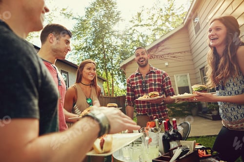 Preview: Laughing, barbecue and group of friends in backyard with food at event for bonding together
