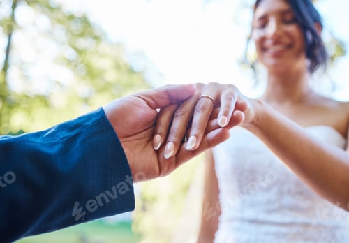Preview: Love, wedding couple and holding hands with ring outdoor for commitment, loyalty and manicure