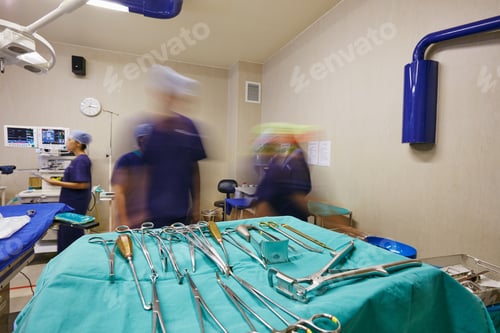 Preview: Hospital, surgery tools and blur of doctors in operation for medical service