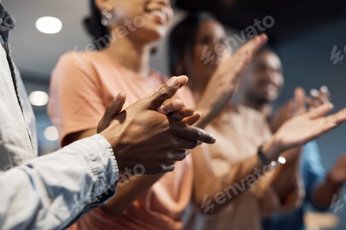 Preview: Shot of a group of businesspeople clapping during a meeting in a modern office