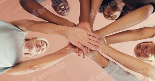Preview: Below, fitness and women in studio, hands stack and motivation with support, huddle and exercise