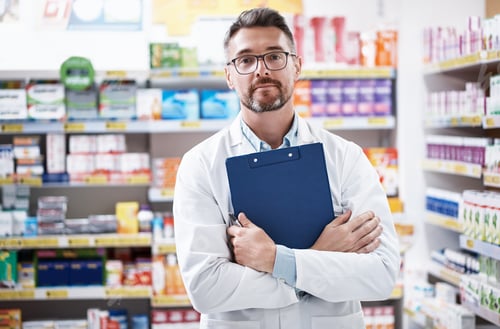 Preview: Pharmacist, man or portrait with clipboard in store for inventory control