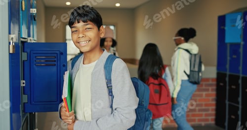 Preview: Happy, education and portrait of boy at lockers for future, child development and knowledge