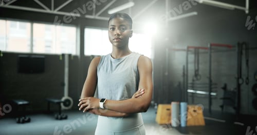 Preview: Fitness, portrait and black woman in gym with arms crossed, serious and confidence