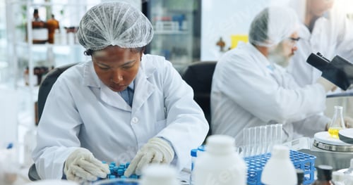 Preview: Woman, scientist and test tube with sample at lab for medical research, chemical